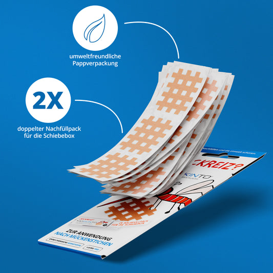 Doppelter Nachfüllpack für die Schiebebox, umweltfreundliche Pappverpackung. Die Pflaster liegen über der Verpackung.